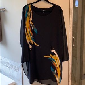 Slimming tunic with sheer overlay